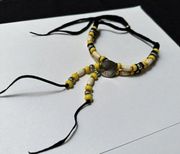 Black / Yellow Bead Silver Tone Indian Head Nickel Necklace