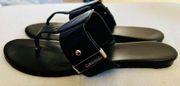 Calvin Klein women’s black thong sandals in size 8.5M