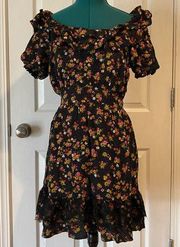 Black flowery dress with ruffles size large midi