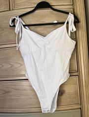 White body suit with tie straps