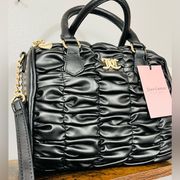 Juicy black satchel run the world in liquorice