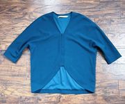 Marie Oliver • teal high low popover blouse notch hem dolman sleeve structured