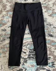 high waisted capri leggings with mesh accents and side pockets