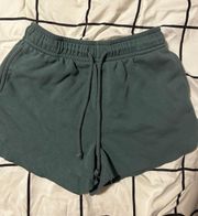 green shorts