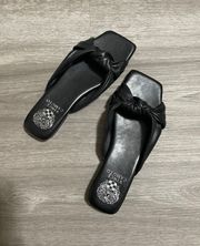 Black Leather Sandals .