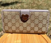 GUCCI
GG Canvas Heart Continental Wallet