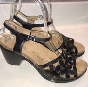 Dansko Women’s Patent Leather Floral Cut Out Ankle Strap Platform Heels