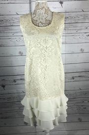 Leslie Fay sleeveless 
Beautiful lace dress with layered ruffles on the end.