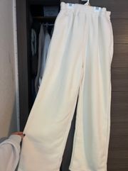 white wide leg sweat pants open at the bottom