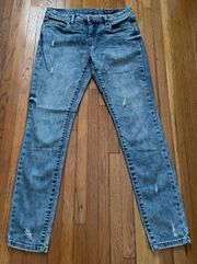 Skinny Classique Distressed Blue Medium Wash Low Rise Jeans, size 28”