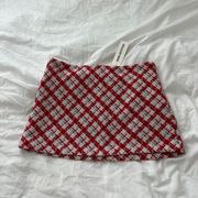 Urban Outfitters tweed mini skirt  Size medium Condition: NWT Color: red  Details : - Hidden side zipper  - Slip underneath  - Comfy