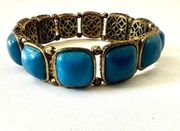 Fossil stretchy square blue  and gold tone bracelet