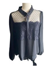NWT- Gorgeous black button front blouse, lace front, black polka dot sheer neckline, ties at neck, 100% polyester, long sleeves, brand new Measurements: Bust: armpit to armpit 20 inches  Length: shoulder seam to bottom 25 inches