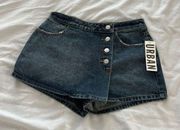 Urban Outfitters denim skort Size 26 Condition: NWT  Color: Blue   Details : - Button down front  - Hidden button and zipper closure  - Comfy  Extras: -  I ship between 1-2 days 