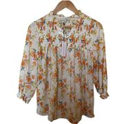 CUPCAKES & CASHMERE smocked flowy floral peasant style blouse