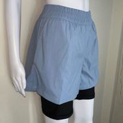 WeWoreWhat Windbreaker Biker Short in Dusty Blue