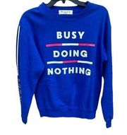 Wound Up “Busy Doing Nothing” fun novelty bright blue sweatshirt size XS