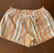 orange and white summer shorts