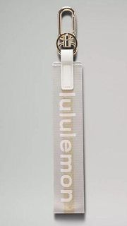 Lululemon Never Lost Keychain - Vapor/Gold