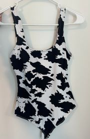 Lelis Collection Black And White Cow Print Body Suit