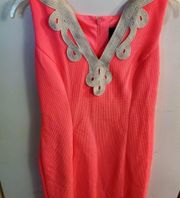 VINCE CAMUTO SIZE 2 sleeveless dress orange with silver appliqué on neckline