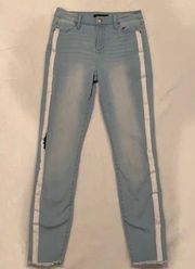 Blue skinny jeans with white stripe