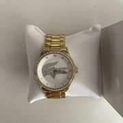 Lacoste gold watch - woman’s