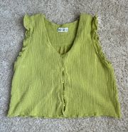 green ruffle shirt