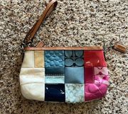 Patterned Coach wristlet