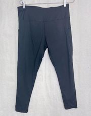 Danskin solid black leggings with side pocket size large