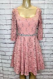 La Scala pink lace dress with a rhinestone  waist size medium