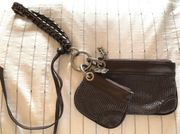 BCBG Leather and Mesh wristlet LKN