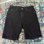 Levi’s vintage 550 faded black relaxed Jean shorts with orange tab