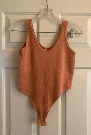 Ribbed Thong Bodysuit in Orange Size M/L