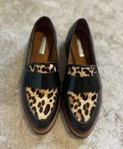 Calf hair cheetah print and black leather loafers