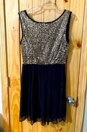 Issi brand size L glittery gold and black dress