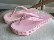 Greca-embossed flip flops