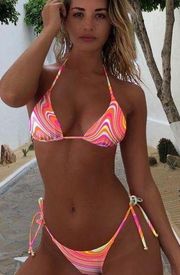 Let's get tanned Tangerine Swirl bikini set 

Top size large