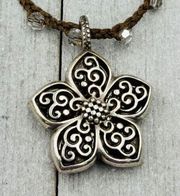 Brighton Silver Toned Flower Reversible Pendant on a Brown Braided Cord. EUC!