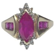 Beautiful 10K Gold Magic Glo Ruby and Diamond Ring Size 7