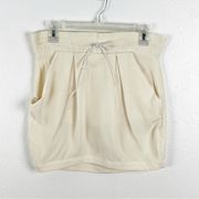 A.L.C. 100% Silk Cream Side Pockets Tie Waist Back Zipper Mini Skirt, Size 2