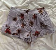 Charlotte Russe floral periwinkle shorts. Size small