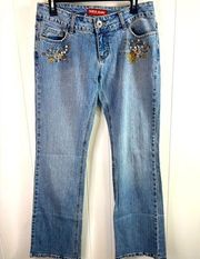 Guess Vintage women’s size 30 authentic boot cut jeans with embellishments.