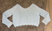 Cropped Women’s light blue distressed sweater