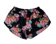 black and pink floral shorts