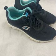 Skechers Sketcher flexsole women size 7.5 blue and black