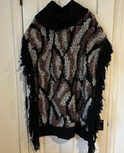 BCBG poncho sweater worn once in flawless condition size medium/large