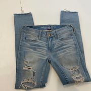 American Eagle AEO X4 4-Way Super Stretch Skinny Jeans Distressed Mid Rise Light Wash EUC Sz 0