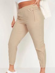 StretchTech Tan Mid-rise Zip Ankle Relaxed Jogger Pants