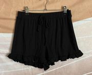 Black peplum shorts